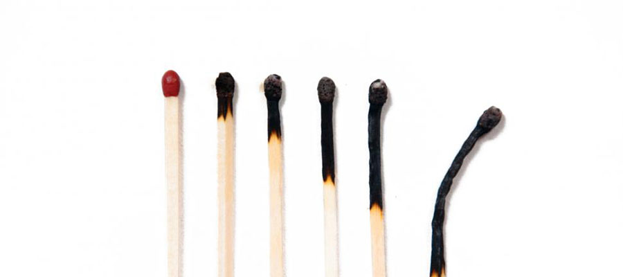 series of burned matches represent physician burnout