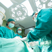 orthopedic surgeons prepping for knee surgery